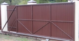 Купить откатные ворота из профнастила Нерюнгри, цена от 1766 руб.